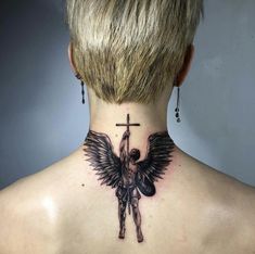 the back of a woman's neck with an angel and cross tattoo on it