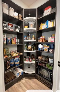 an open pantry with lots of food in it