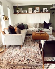 a living room filled with furniture and decor