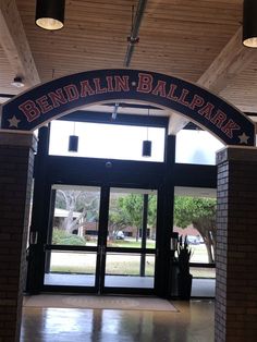 the entrance to bendalin and ballpark is lit up with lights from above