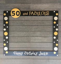 a 50th birthday frame with the number 50 and fabulous