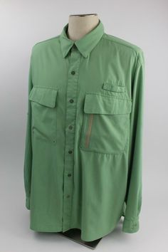 Three Forks Ranch Vented Outdoor Fishing Hiking Camping Shirt 2XL Poly Green Three Forks Ranch Vented Outdoor Fishing Hiking Camping Shirt 2XL Poly Green Click images to enlarge Description Good quality shirt in a comfortable fabric, loose fit style for sporting outdoor activities.  Overview:​ Moisture wicking Multiple pockets Spread collar Button cuff and buttoned sleeve placket with roll tab long sleeves Ventilated back overlay with contrast mesh interior Straight uneven vented hem S Camping Shirt, Outdoor Sports, Military Jacket, Fitness Fashion, Loose Fitting, Sports, Mens Tops, Long Sleeve