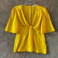 Brilliant Yellow Blouse * Never Used * Still With Tags * Little Sticky Stain Almost Not Noticeable And Could Be Fixed After First Wash. Elegant Yellow V-neck Top, Zara Yellow Party Top, Yellow Zara Top For Party, Yellow V-neck Top For Party, Elegant Yellow V-neck Blouse, Zara Short Sleeve Blouse For Spring, Fitted Yellow Zara Blouse, Chic Yellow Zara Blouse, Zara V-neck Top For Brunch