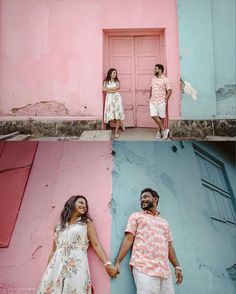 two people holding hands and standing in front of a pink building with blue doors, one person wearing a floral dress