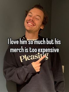 a man is smiling and pointing to the side with his hand on his hip while wearing a sweatshirt that says, i love him so much but his merch is too expensive