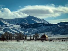 the mountains are covered in snow and there is no image on this page to describe