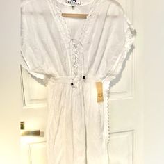 Adorable, White Beach, Cover-Up Style Dress. With Embroidered Accents On The Side And Front V-Neck Deal With Tags. Made By Surf Style An Ethnic Company. Cotton V-neck Cover-up For Day Out, V-neck Cotton Cover-up For Day Out, Cotton V-neck Beach Dress For Day Out, Spring Brunch Cover-up With Short Sleeves, Casual Beach Season Dress With Lace Trim, Casual Beach Dress With Lace Trim, Spring V-neck Beach Dress With Lace Trim, Short Sleeve Dress With Lace Trim For Beach, Casual Lace Trim Dress For Beach Season