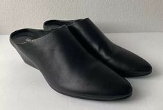 VANELI women’s black leather mules size 9 N shoes. Condition is pre- owned. Shipped with USPS priority mail. Black Clogs For Formal Spring Occasions, Black Formal Clogs For Spring, Formal Black Clogs For Spring, Spring Formal Black Clogs, Black Almond Toe Clogs For Formal Occasions, Formal Black Almond Toe Clogs, Formal Black Slip-on Clogs, Sleek Black Mules With Leather Sole, Black Synthetic Mules With Leather Sole