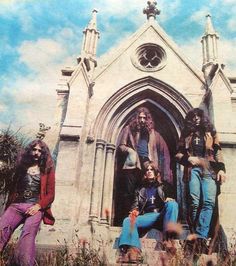 an old photo of the band aeroid in front of a gothic - styled church