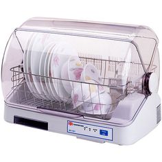 the dishwasher is filled with dishes and has two mice in it's cage