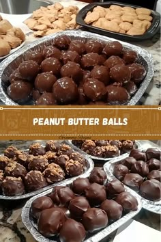 several trays of peanut butter balls are on the table with other cookies and pastries