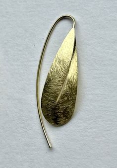 Drop earrings with a modern leaf like design. Details: Hook back suitable for pierced ears. Size: Length of drop: ~ 2.25" (6 cm), width of widest part: ~1.5" (4cm) Material: brass, if silver colored then silver plated brass Brushed Metal, Drop Earring, Butterfly Earrings, Pierced Ears, Ear Piercings, Design Details, Silver Plate, Silver Plated, Brass