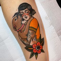 a woman with a horse tattoo on her leg and the caption says, for the win tatoo co