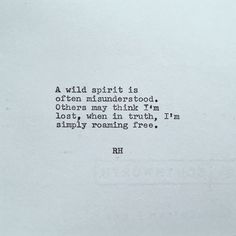 an old typewriter with the words wild spirit is written in black on white paper