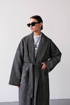 Introducing our Grey Wrap Long Kimono Coat, the perfect blend of style and comfort for the winter season! Crafted from luxurious vegan wool, this coat is designed to keep you warm while making a chic fashion statement.  Featuring a padded insulated lining and coat fabric of 30% wool and 70% polyester, this long oversized coat provides exceptional warmth without sacrificing style. The elegant kimono design drapes beautifully, offering a flattering silhouette that works for any occasion.  This ver Elegant Kimono, Winter Coat Women, Women Kimono, Kimono Coat, Kimono Design, Women Coat, Coat For Women, Coat Winter, Long Kimono