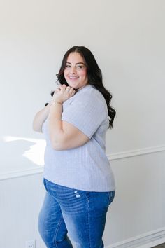 *ALL SALES FINAL* *NOT ELIGIBLE FOR RETURN* Get ready to rock the denim blue hue of the Myla Top! With a ribbed texture and v-neck henley design, this top is perfect for a casual and cool look. Short sleeves make it versatile for any season. Add it to your wardrobe for a playful touch! Fits true to size. Model is wearing a small and is 5'7". Plus model is wearing a 1X and is 5'5". Size Chart Length Bust S 20" 34" M 21" 36" L 21" 38" 1x 24.5" 46" 2x 25.5" 52" 3x 26" 56" *All measurements are appr Everyday Blue Ribbed Tops, Everyday Ribbed V-neck Top, Everyday Ribbed V-neck Knit Top, Everyday Ribbed Henley Neckline Tops, Everyday Ribbed Henley Tops, Hanging Fabric, Ribbed Texture, Blue Hues, Blue Denim