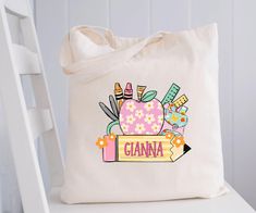 💌Carry anything in this wonderful mid-size canvas tote bag!💌 It is 100% cotton and comes in one size - 15" x 16"- perfect for everyday wear. The canvas material is durable and will last for years. The bag features 20" handles (made from the same canvas). If you want to buy multiple bags with different names, please add each bag to the cart separately! 💌 D E T A I L S * 100% Cotton canvas. Made from spun fibers that make a very strong and durable fabric. * Heavy fabric (12 oz/yd² (406.9 g/m * Back To School Preschool, Kids Tote Bag, Kids Totes, Kindergarten Books, Book Tote Bag, Preschool Kindergarten, Personalised Kids, Canvas Material, Custom Name