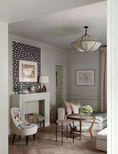 a living room filled with furniture and a fire place