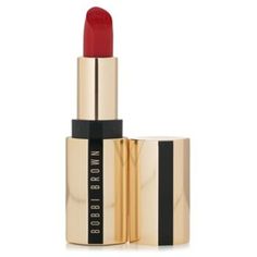 A skincare-infused statement lip color with a rich satin finish. Intensely rejuvenates lips, helping to visibly reduce the appearance of lip lines. Provides a long-time nourishing moisture. Helps relieve lip flaking. Delivers high-coverage color in just one swipe. The shades balanced with neutral tones to flatter all complexions. Design house: Bobbi Brown. Gender: Ladies. Category: Cosmetics. Type: Luxe Lipstick. SubType: Shadow. Beauty group: Eyes. Size: 0.12 oz. Color: # Parisian Red. Barcode: 716170260327. Bobbi Brown Ladies Luxe Lipstick 0.12 oz # Parisian Red Makeup 716170260327. Red Makeup, Versace Watch, Fine Pens, How To Line Lips, Cheap Gifts, Fragrance Gift Set, Lip Color, Design House, Neutral Tones