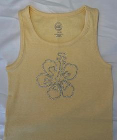 a yellow tank top with an octopus on it