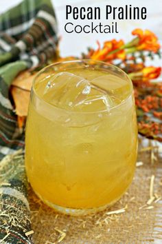 a close up of a drink in a glass on a table