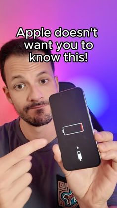 a man holding up an iphone with the caption apple doesn't want you to know this