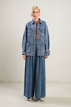 Button-down, long sleeve, washed denim midi jacket, featuring front pockets and self belt. 100% Cotton (Bust - Waist - Hips) Small 2-4 (34 - 26 -36) Medium 6 (36 - 28 -38) Large 8-10 (38 - 30 -40) Washed Blue Denim Jacket With Patch Pockets For Fall, Oversized Utility Jeans For Fall, Denim Blue Washed Utility Outerwear, Washed Denim Utility Jacket For Workwear, Denim Utility Jacket Washed Style, Denim Utility Jacket Washed, Washed Blue Utility Jacket For Fall, Medium Wash Utility Outerwear, Washed Medium Wash Utility Jacket