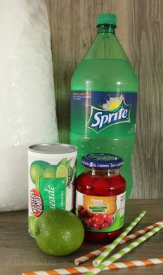 some fruit and drinks are sitting on a table next to a bag of toilet paper