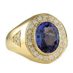 Stamped: 14K Yellow Gold Total Ring Weight: 8.5 Grams Ring Length: N/ARing Width: N/A Gemstone Weight: Total Natural Tanzanite Weight is 4.25 Carat (Measures: 12.10x9.80 mm) Color: Blue Diamond Weight: Total Natural Diamond Weight is 0.70 Carat Quantity: 26 Color: F-G, Clarity: VS2-SI1 Face Measures: 17.90x15.25 mm Sku: [702102W] Yellow Gold Tanzanite Diamond Ring With Halo Setting, Yellow Gold Tanzanite Rings With Brilliant Cut, Heirloom Tanzanite Rings In Yellow Gold, Heirloom Tanzanite Yellow Gold Rings, Gia Certified Diamond Gemstones, Luxury Tanzanite Yellow Gold Ring, Gold Tanzanite Diamond Ring Fine Jewelry, Luxury Yellow Gold Tanzanite Ring, Luxury Yellow Gold Gia-certified Sapphire Ring