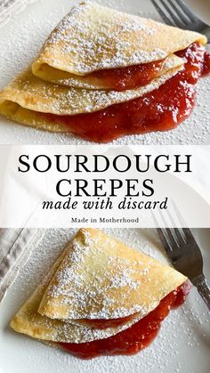 three crepes on a white plate with powdered sugar and strawberry jam in the middle