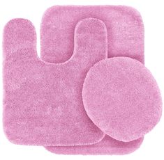 three pink bathroom rugs on top of each other