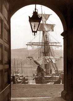 an old photo of a boat in the water