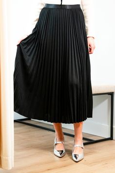 Get ready for an evening out with our Victoria skirt. Featuring a luxurious black accordion pleated design, this midi length skirt exudes elegance and refinement. Elevate any outfit with this chic and sophisticated piece. Elastic satin waistband Mary Grace is wearing XS/S with a 32B bust, 25” waist and 36” hip. 95% Polyester, 5% Spandex Hand wash cold and line dry Luxe Lounge, Pre Fall Collection, Midi Length Skirts, Cardigan Vest, Dress Romper, Bottoms Pants, Outerwear Jackets, Midi Length, Long Sleeve Sweater