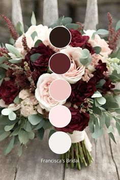 a bridal bouquet with burgundy and white flowers