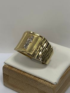 ● Mens Real Gold 14K Solid Yellow and White Gold 14 Karat Diamond Cut Ring St Jude Saint Jude San Judas Religious Anillo Mens Jewelry ●Metal : 14K Solid Yellow and White Gold ●Purity : 14k with authenticity stamp ●Made in : United States ●Shape : Saint Jude St Jude St Judas ● Size: 10 ● Weight: Approx 3.8 Grams ● Size: (Message us for custom size) If sizing is needed then message before placing your order for the price. The item will not be eligible for return if the sizing is done also the pric St Judas, Diamond Cut Ring, Diamond Ring Cuts, Saint Jude, St Jude, Jewelry Metal, Stamp Making, Solid Yellow, Diamond Cut