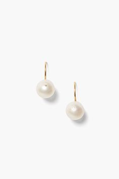 An essential piece you'll reach for everyday, this drop earring features a white freshwater potato pearl drop on an 18k gold plated sterling silver French hook. Pair with dainty gold earrings to perfect the layered look. 18k gold plated sterling silver. 5/8" drop. Handmade in Vietnam. Classic White Pearl Earrings For Everyday Elegance, Classic Pearl Pendant Earrings In 14k Gold Filled, Classic 14k Gold Filled Earrings With Pearl Charm, Everyday 14k Gold Pearl Drop Earrings, Classic Yellow Gold Pearl Earrings For Everyday Elegance, Classic Yellow Gold Pearl Earrings For Everyday, White Drop Pearl Earrings For Everyday Elegance, Classic Everyday Pearl Drop Earrings, Classic 14k Gold Filled Pearl Pendant Earrings