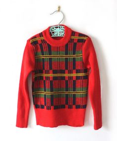 FRENCH VINTAGE 70's, very nice patterned sweater, soft stretchy knit ( acrylic and wool blend ), fully fashioned, geometric pattern. Brand " Marie Lecoeur - Paris " ( French brand but made in Italy ). Size 4 years Vintage condition level 5, new old stock ( washed once ) We assess the condition of our vintage items on a scale from 0 to 5. Level 5 corresponds to an almost new vintage condition. Any defects are systematically reported. Even though in very good condition, vintage items may present i Retro Plaid Sweater For Fall, Retro Jacquard Knit Sweater For Fall, Vintage Patterned Winter Sweater, Retro Fall Sweater, Vintage Fair Isle Patterned Sweater, Vintage Jacquard Knit Sweater, Vintage Wool Jacquard Knit Sweater, Retro Long Sleeve Argyle Sweater, Vintage Fair Isle Tops For Fall