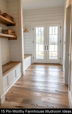 the inside of a house with wood floors and white walls, open shelves on either side