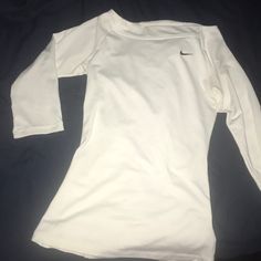 Super Cute Workout Shirt! Never Worn! Fits True To Size! It Is From The Tennis Line Of Nike. Casual White Workout Shirt, Nike Fitted Long Sleeve Tops, Basic White Workout Top, Basic White Nike Top, White Nike Tops For Spring, White Long Sleeve Workout T-shirt, White Crew Neck Workout Tops, White Crew Neck Tops For Workout, Basic Nike Tops For Workout