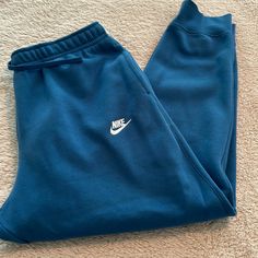 These Nike Men’s Fleece Joggers In Blue Size Xl. These Were Never Worn But Do Not Have Tags Attached. They Are In Excellent Condition. They Have Two Side Pockets And One Back Pocket With A Snap. Nike Sweatpants Blue, Sporty Blue Nike Sweatpants, Nike Blue Sweatpants With Pockets, Nike Blue Athleisure Joggers, Blue Fleece Joggers With Pockets, Pants Nike, Nike Pants, Back Pocket, Fleece Joggers