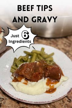 beef tips and gravy on a plate with green beans