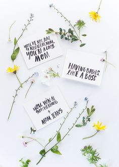 three cards with flowers and some words on them that say, having babies have a boss