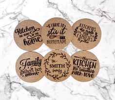 four cork coasters with the words kitchen and home printed on them