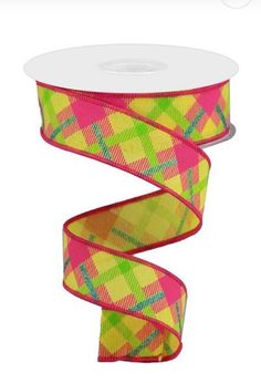 a pink and green plaid ribbon on a white background