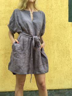 "Loose linen tunic with pockets. Great choice when you need comfortable and stylish outfit combination. You can wear it with trousers, leggings, shorts, skirts. The good thing about tunics is that you can wear them also by themselves with nothing or for example as beach cover ups. Linen tunic dress is perfect for warm days and vacation. As linen regulates body temperature, is lightweight and really absorbent, which makes it the perfect fabric for summer. ABOUT Length of this linen tunic in front Bohemian Tunic Dress With Pockets, Summer Tunic With Pockets For Daywear, Relaxed Fit Flax Linen Beach Dress, Beach Dress In Flax With Short Sleeves, Summer Tunic With Pockets, Relaxed Fit Flax Dress For Beach, Summer Short Sleeve Tunic With Pockets, Relaxed Fit Flax Color Beach Dress, Relaxed Fit Flax Linen Dress With Pockets