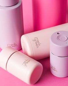 three different types of cosmetic containers on a pink background with the words frank & son