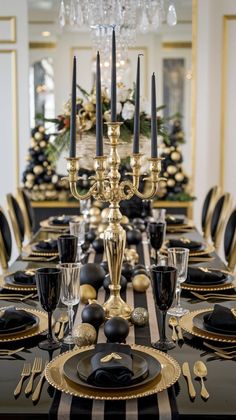 a black and gold christmas table setting