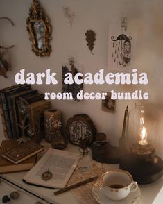 a desk with books, candles and other items on it that says dark academy room decor bundle