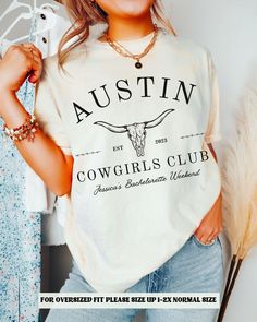 a woman wearing a cowgirl's club t - shirt with the words, for over sized please size up to 25 normal size