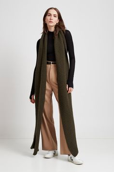 Make your style A LOT cozier with our extra-long Bronx Scarf. Bronx is both knit from ultra-soft French Merino Wool mix to warm your soul and fashioned extra long to make a statement. Wrap this Merino wool scarf around and around for volume, or wear her draped over your shoulders to lend your look texture and drama. This soft wool scarf also doubles perfectly as an airplane blanket. | Steph Burnt Yellow, Airplane Blanket, Merino Wool Scarf, Cozy Accessories, Crochet Clothing, Oversized Scarf, The A Team, Long Scarf, Grey Women